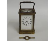 An antique French Henri Jacot brass carriage clock, 6in tall, chimes, wound but not running