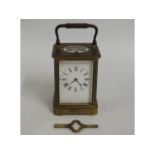 An antique French Henri Jacot brass carriage clock, 6in tall, chimes, wound but not running