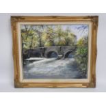 A gilt framed oil of Clapper Bridge at Pillaton, C