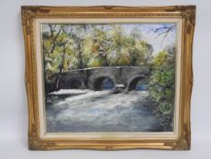 A gilt framed oil of Clapper Bridge at Pillaton, C