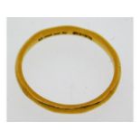 A 22ct gold band, size N, 2.4g