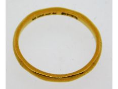 A 22ct gold band, size N, 2.4g