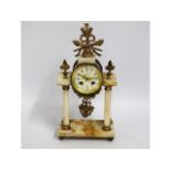 A 19thC. portico style clock on marble base & pill