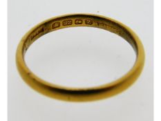 A 22ct gold band, size P, 3.2g