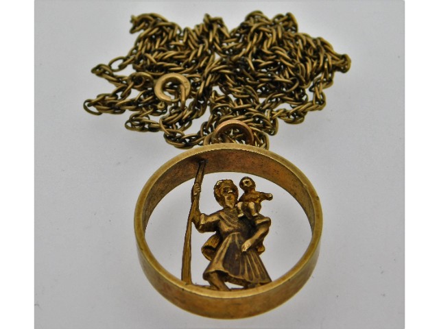 A 9ct gold chain & a yellow metal St. Christopher pendant, tests electronically as 9ct gold, 17.4g