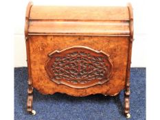 A Regency period walnut Canterbury with fretwork d