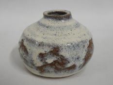 A Japanese stoneware pot, indistinctly signed, 3.5