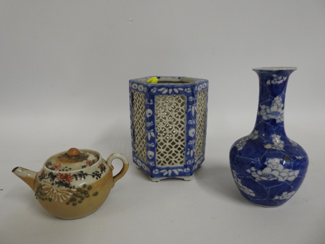 A Chinese porcelain prunus vase, 6in tall, twinned