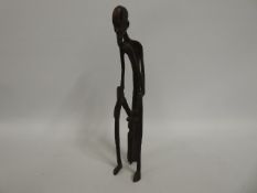 A decorative bronze African figure, 13.75in tall