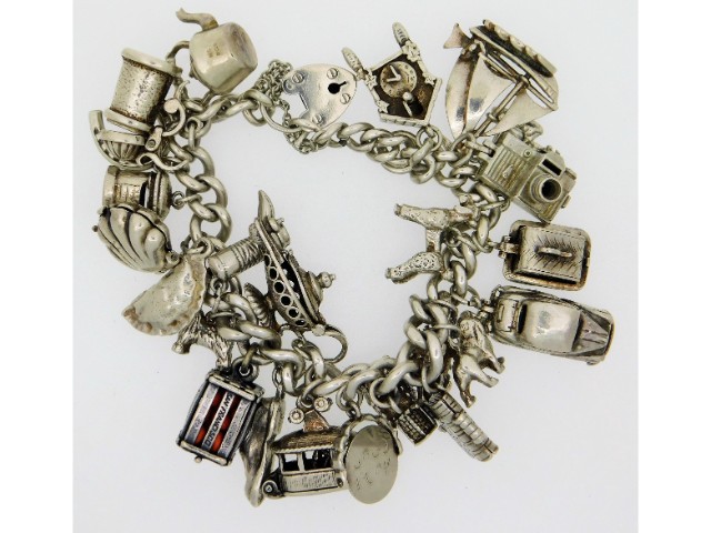A silver charm bracelet, 96.9g