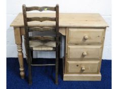 A pine desk twinned with oak ladder back chair, 42