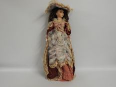 A boxed, large porcelain headed doll "Rosemary" by