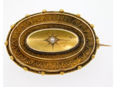 An antique 15ct gold mourning brooch set with pear