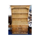 An antique pine farmhouse kitchen dresser, 78in hi