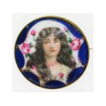 An enamel brooch depicting a young woman, 36mm dia
