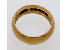 A 9ct gold band, size S/T, 8.3g