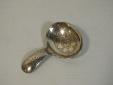 An Edwardian Sheffield silver caddy spoon by W. S.