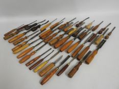 A quantity of mostly wooden handled carpenters han