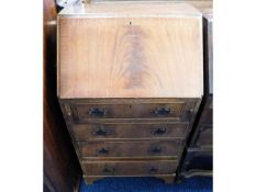 A mahogany bureau with four drawers, 39in high x 2