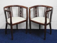 A pair of Edwardian mahogany tub chairs, 29.5in hi