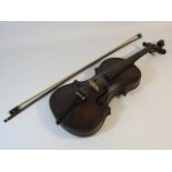 An antique violin, no maker mark, with bow & case,