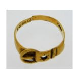 An antique 18ct gold buckle ring, loss of stone &