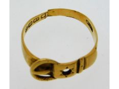 An antique 18ct gold buckle ring, loss of stone &