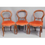 Three Victorian mahogany balloon back chairs