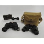A pair of military issue binoculars twinned with K