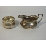A silver creamer, rubbed mark by George Nathan & R