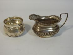 A silver creamer, rubbed mark by George Nathan & R