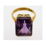 An 18ct gold amethyst ring, size N, 8.1g