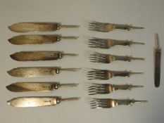 A quantity of silver parts to fish knives & forks,