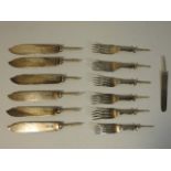 A quantity of silver parts to fish knives & forks,