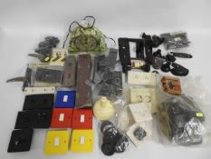 A quantity of bakelite items inc. door handles, st