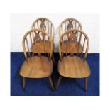 Four Ercol dining chairs