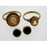 A 9ct gold cameo ring twinned with 9ct gold yellow topaz ring & a pair of 9ct gold & onyx earrings,