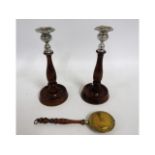 A pair of 1920's oak candle holders twinned with a