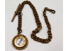 An antique compass of a plated Albert chain