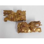 A pair of 19thC. Chinese gilded carved wood roof f