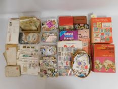 A quantity of mixed stamp ephemera, reference book