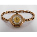 A ladies 9ct gold wrist watch & strap, 22.1g