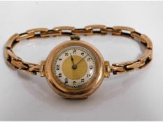 A ladies 9ct gold wrist watch & strap, 22.1g