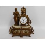 A 19thC. French gilt clock, 14in high