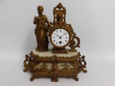 A 19thC. French gilt clock, 14in high