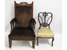 An upholstered arm chair twinned with a 19thC. low