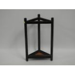 A corner umbrella/stick stand, 27in tall