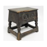 An 18thC. oak joint stool with later carving, 17.6