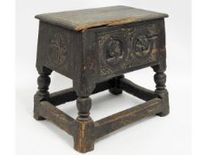 An 18thC. oak joint stool with later carving, 17.6