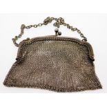 A Sheffield silver purse, date mark for 1915, 68.9